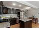 Well-equipped kitchen featuring stainless steel appliances, granite countertops, and a cozy dining area at 880 Glendale Ne Ter # 9, Atlanta, GA 30308