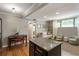 Open concept living room and dining area features hardwood floors and natural light at 880 Glendale Ne Ter # 9, Atlanta, GA 30308