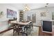 Bright dining room with rustic table and natural light at 1 James River Ne Pl, Atlanta, GA 30342