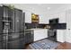 A well-equipped kitchen features stainless steel appliances and stylish backsplash, adding a modern touch at 1 James River Ne Pl, Atlanta, GA 30342