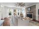 Cozy living room features a fireplace, wooden floors, and natural light at 1 James River Ne Pl, Atlanta, GA 30342