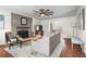 Cozy living room features a fireplace, wooden floors, and an open layout at 1 James River Ne Pl, Atlanta, GA 30342