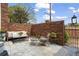 Brick patio features comfortable seating, plantings and a brick wall providing privacy at 1 James River Ne Pl, Atlanta, GA 30342