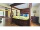 Bedroom features a decorative canopy bed, fireplace and an open layout for extra space at 1200 Izod Ct, Lawrenceville, GA 30044
