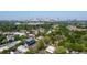 Scenic aerial view showcasing the neighborhood with the city skyline in the background, surrounded by lush greenery at 1326 Metropolitan Se Ave, Atlanta, GA 30316