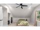 Cozy bedroom with sloped ceiling, fan, and window with natural light at 1326 Metropolitan Se Ave, Atlanta, GA 30316