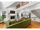 Spacious living room showcasing a stone fireplace, hardwood floors, and an open layout at 1326 Metropolitan Se Ave, Atlanta, GA 30316