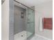 Stylish shower with gray subway tile, niche, glass door, and hexagonal floor at 1326 Metropolitan Se Ave, Atlanta, GA 30316