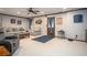 Cozy basement featuring a sofa, chair, area rug and stylish decor perfect for relaxation and entertaining at 1570 Hill Crossing Ct, Grayson, GA 30017
