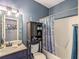 Bathroom vanity with storage, decorated in a nautical theme at 1570 Hill Crossing Ct, Grayson, GA 30017