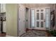 Entryway with decorative front door and wood floors at 1570 Hill Crossing Ct, Grayson, GA 30017