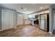 Contemporary kitchen with stainless appliances, white cabinets, and modern backsplash at 2077 Perkerson Rd, Atlanta, GA 30310