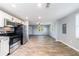 Open-concept living room boasts modern finishes and ample natural light throughout the space at 2077 Perkerson Rd, Atlanta, GA 30310