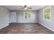 Inviting living room features wood-look floors, neutral paint, and bright natural light at 2077 Perkerson Rd, Atlanta, GA 30310
