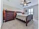 Charming bedroom with a classic bed frame, dresser, and a decorative accent wall at 815 Commerce Trl, Canton, GA 30114