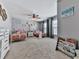 bedroom featuring twin beds, modern wall decor, fan and large windows for plenty of light at 815 Commerce Trl, Canton, GA 30114