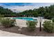 Relaxing adult pool with lounge chairs and lush greenery in a gated community at 815 Commerce Trl, Canton, GA 30114