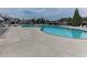 Large community pool with wading pool and ample seating for residents at 815 Commerce Trl, Canton, GA 30114