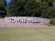 Stone entrance sign welcomes you to Towne Mill at 815 Commerce Trl, Canton, GA 30114