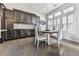 Bright dining area with lots of natural light and dark wood cabinets at 815 Commerce Trl, Canton, GA 30114
