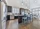 Eat-in kitchen with stainless appliances, stone backsplash, granite countertops, and window at 815 Commerce Trl, Canton, GA 30114