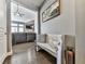 Hallway shot featuring hardwood floors and a glimpse into the living room, complete with a stone fireplace at 815 Commerce Trl, Canton, GA 30114