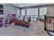 Cozy loft area with comfortable seating, perfect for a ' playroom or den at 815 Commerce Trl, Canton, GA 30114