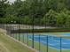 Several tennis courts with lights and fences offer an active lifestyle at 815 Commerce Trl, Canton, GA 30114
