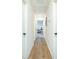 Hallway with wood floors and white walls at 90 Cerro St, Atlanta, GA 30314