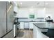 Spacious kitchen features stainless steel appliances, modern fixtures, and ample counter space at 90 Cerro St, Atlanta, GA 30314