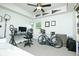 Bright office with grey carpet, a black desk and chair, and decorative sports pennants at 90 Cerro St, Atlanta, GA 30314