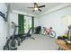 Room featuring gym equipment, exercise bike, ceiling fan and carpeted floors at 90 Cerro St, Atlanta, GA 30314