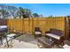 Relaxing outdoor patio with a grill and comfortable seating at 1427 Lanier Vista Dr, Sugar Hill, GA 30518