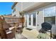 Cozy patio with woven furniture perfect for outdoor entertaining at 1427 Lanier Vista Dr, Sugar Hill, GA 30518