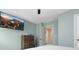Well-lit bedroom with a ceiling fan and plenty of space at 1427 Lanier Vista Dr, Sugar Hill, GA 30518