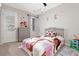 Charming bedroom featuring whimsical unicorn decor and a comfortable bed at 1427 Lanier Vista Dr, Sugar Hill, GA 30518