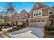 Beautiful brick townhomes with well-manicured landscaping at 1427 Lanier Vista Dr, Sugar Hill, GA 30518