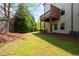 Spacious backyard with a deck and landscaped area at 2171 W Village Se Ln, Smyrna, GA 30080