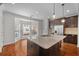 Stylish kitchen with granite countertops, stainless steel appliances, and a sunlit breakfast nook at 2171 W Village Se Ln, Smyrna, GA 30080