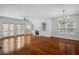 Open-concept living room featuring hardwood floors, fireplace, and natural light at 2171 W Village Se Ln, Smyrna, GA 30080
