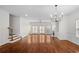 Expansive living room with staircase, fireplace, and access to the outdoor at 2171 W Village Se Ln, Smyrna, GA 30080