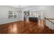 Open-concept living space featuring a kitchen island and dining area with great natural light at 2171 W Village Se Ln, Smyrna, GA 30080