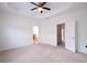 Spacious main bedroom featuring tray ceiling and carpeted floors at 2171 W Village Se Ln, Smyrna, GA 30080