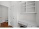 Bright office nook with built-in desk and shelving for organized workspace at 2171 W Village Se Ln, Smyrna, GA 30080