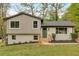 Charming home featuring a modern exterior, well-manicured lawn, and inviting front entrance at 2637 Crestdale Se Cir, Atlanta, GA 30316