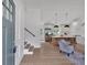 Open-concept kitchen with stainless steel appliances, large island, and stylish pendant lighting at 2637 Crestdale Se Cir, Atlanta, GA 30316