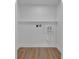 White laundry room with hardwood floors at 2637 Crestdale Se Cir, Atlanta, GA 30316