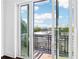 Balcony doors open to city views with a black iron railing at 443 Plateau Nw Pl, Atlanta, GA 30309