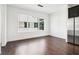 Bright dining area with hardwood floors, bright, light-colored walls, and a large window at 443 Plateau Nw Pl, Atlanta, GA 30309