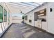 Outdoor kitchen complete with stainless steel grill, granite countertop, lighting, and ceiling fan at 443 Plateau Nw Pl, Atlanta, GA 30309